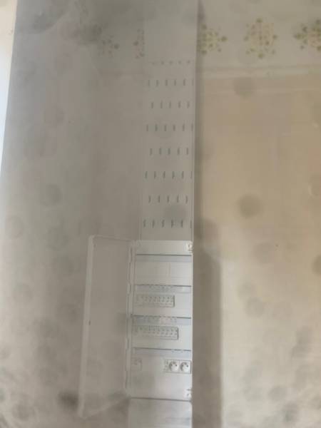 mise aux normes tableau électrique 4 rangees pour un appartement de 50m2 